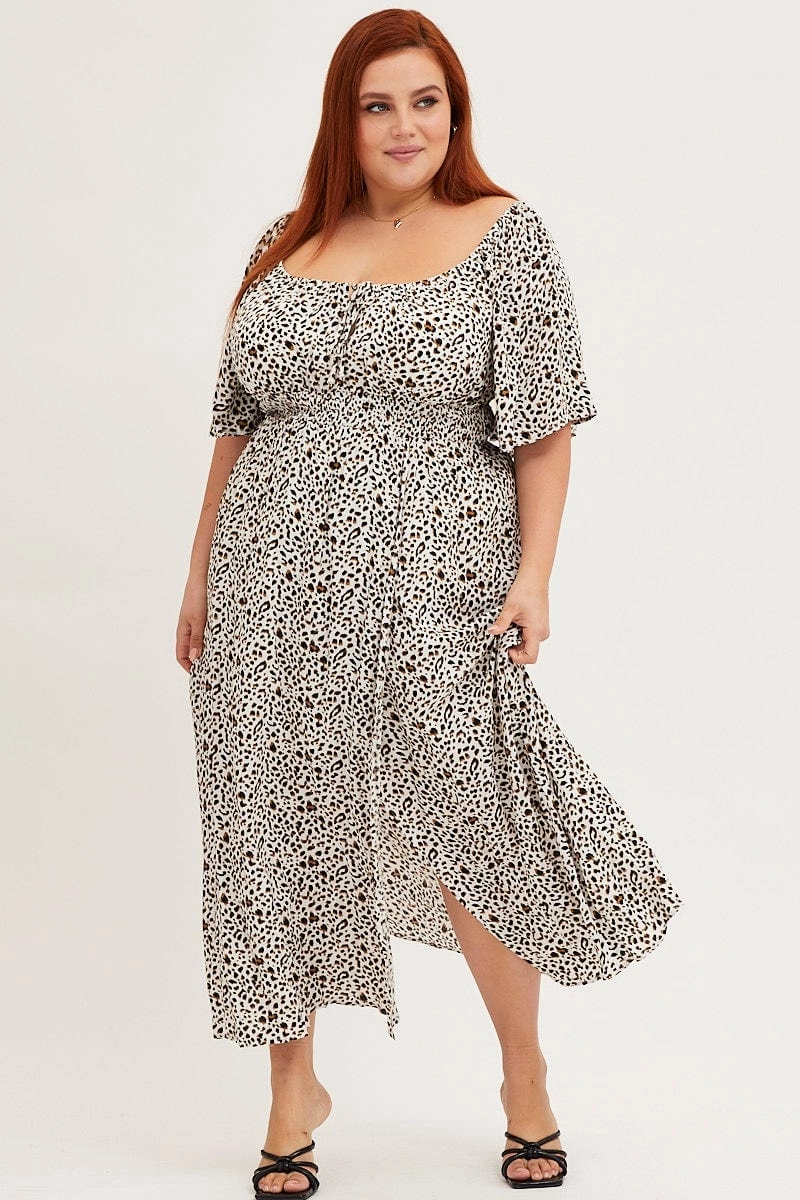 Sleek and Flattering Sleek Volume Animal Print Short Sleeve Midi Dress
