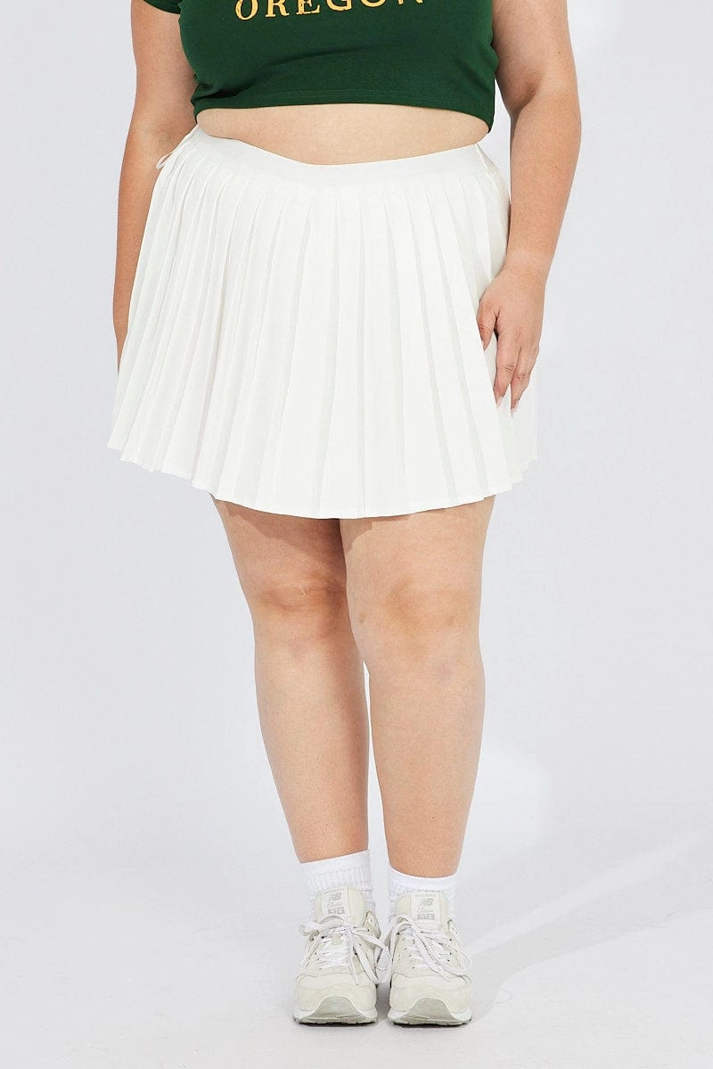 White Pleat Tennis Skirt Shorts Underneath Evening Outing Iconic Style