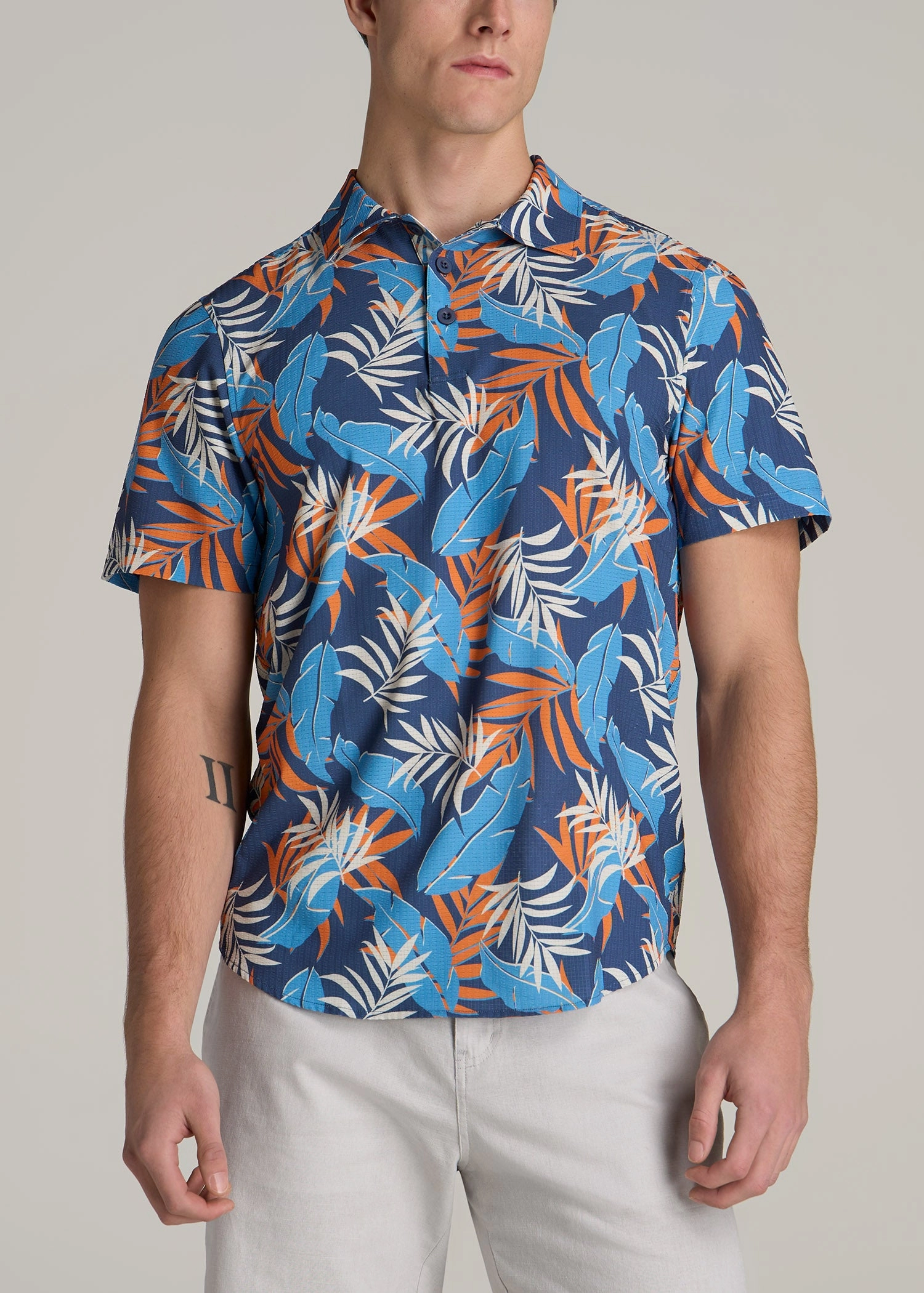 Coastal Perforated Tall Men's Polo Shirt in Blue and Orange Palms Temperature control