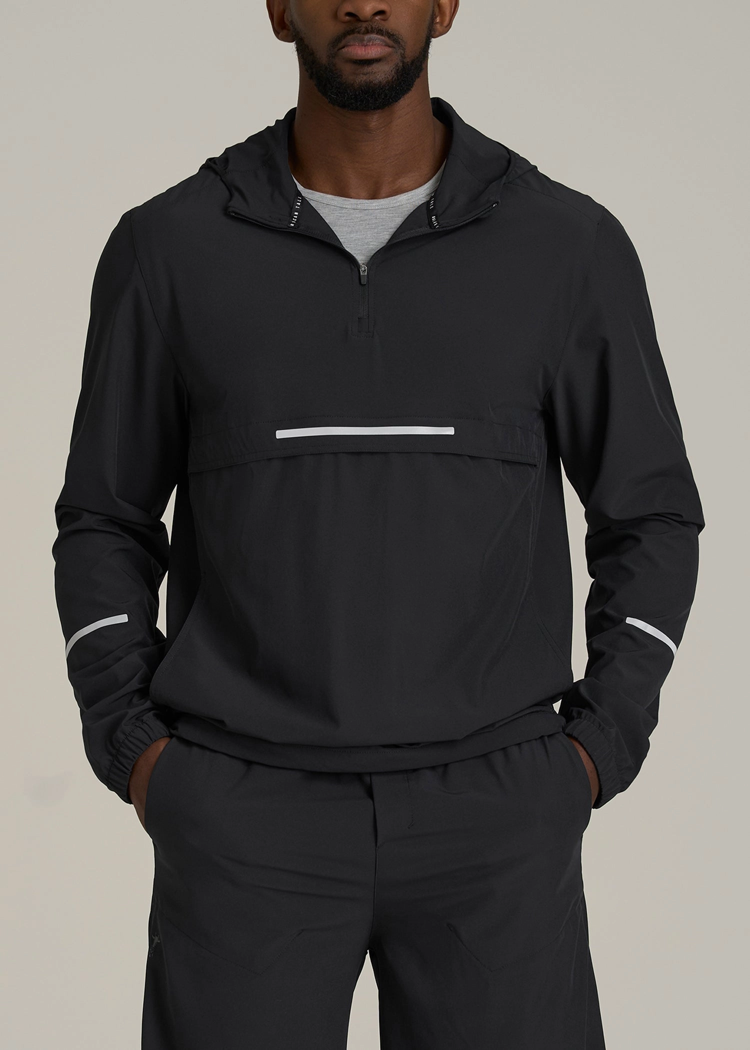 Featherweight Packable Anorak for Tall Men in Black Friction Reducing Lining Collapsible Packable Design