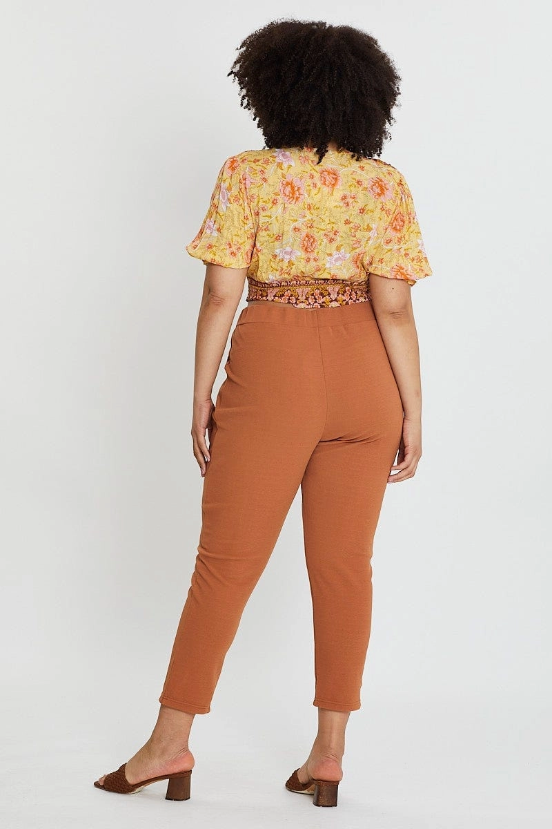 Metallic accents Stylish Look Beige Mid Rise Black Slim Pants