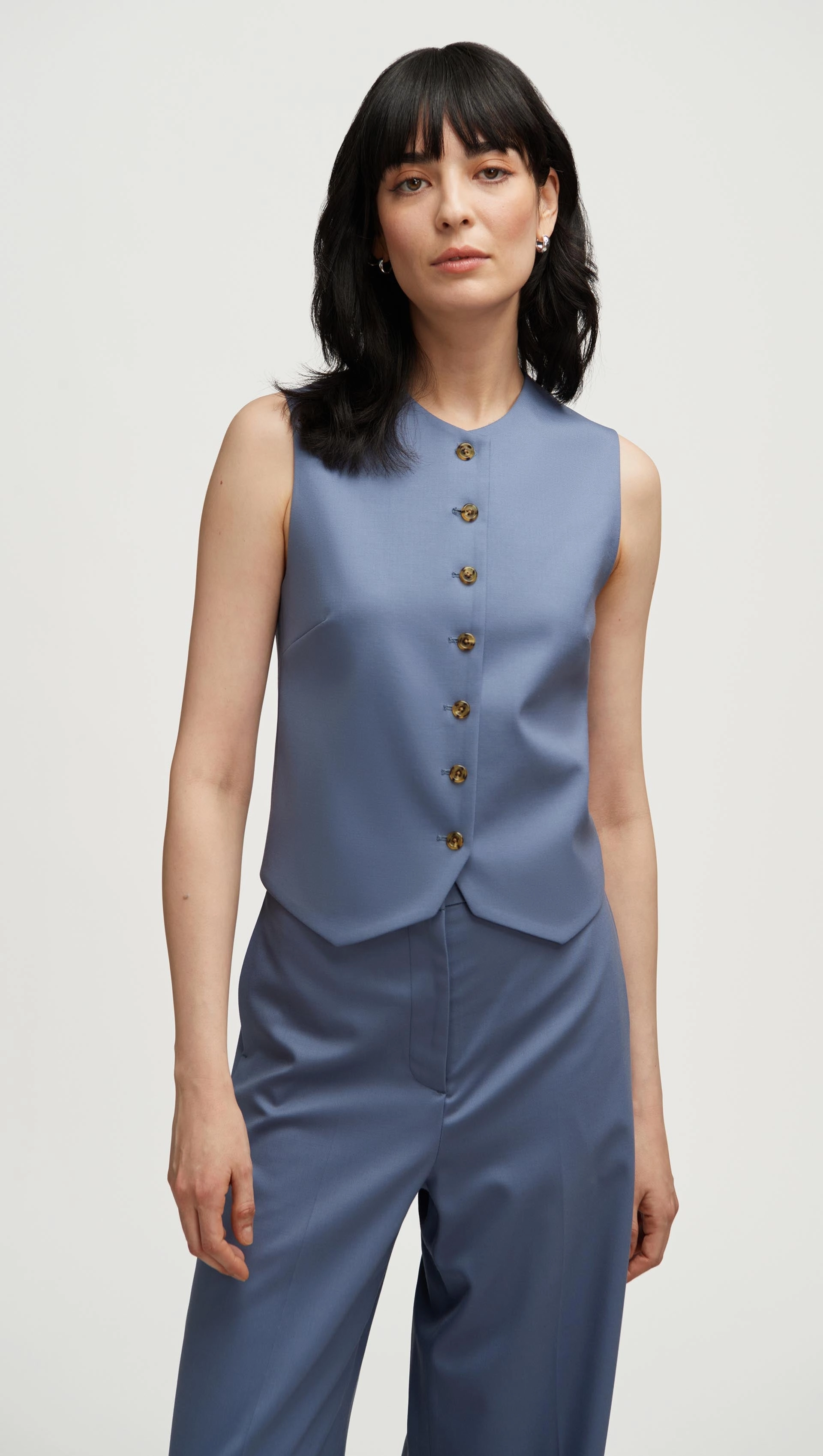 High-Neck Button Waistcoat in Seasonless Wool | Powder Blue Flatlock Seam Technique Sustainable Material Blend