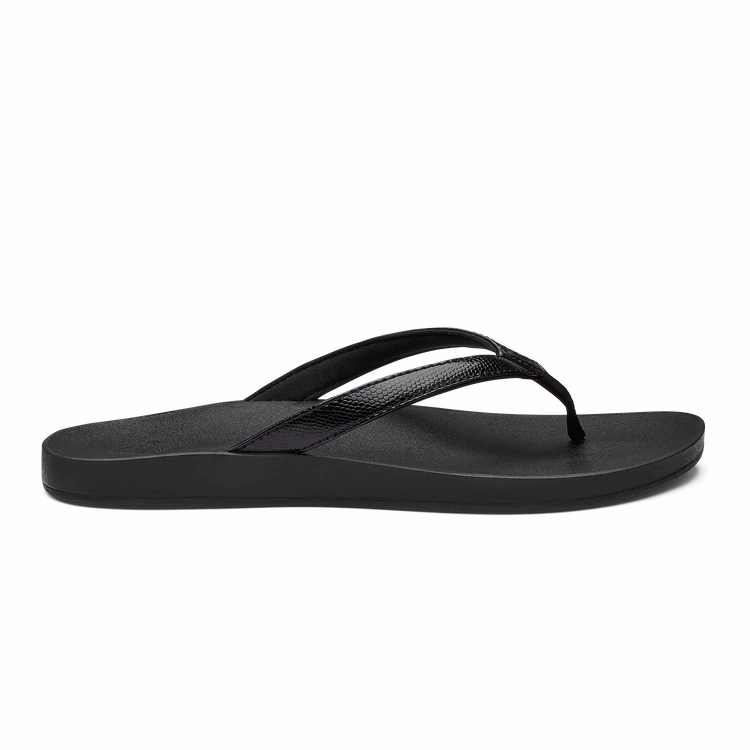 Flex grooves Olukai Women's Puawe Sandal - Black/Black