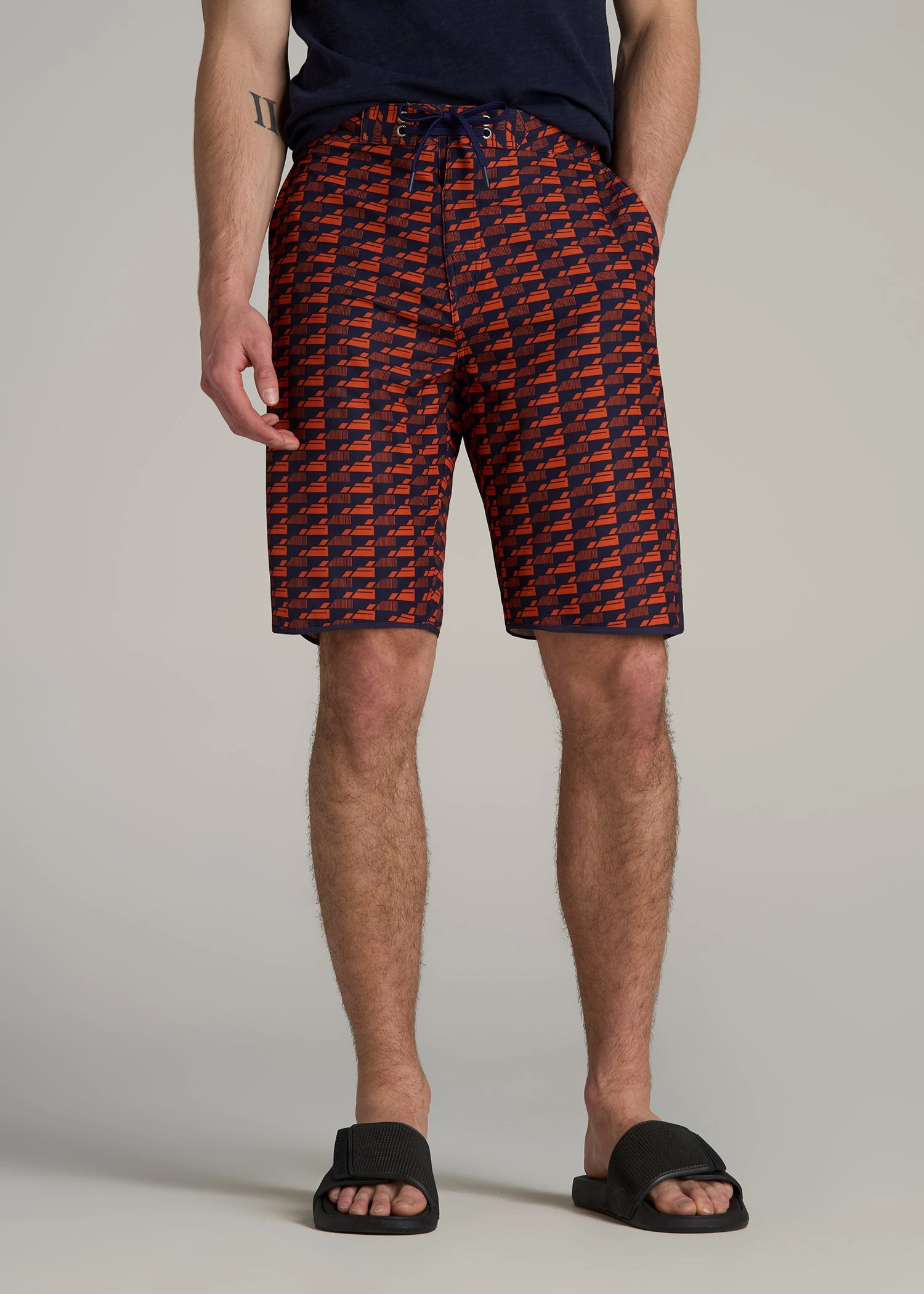 Stay Flexible Hi-Tide Scallop Board Shorts for Tall Men in Bright Orange Geometric