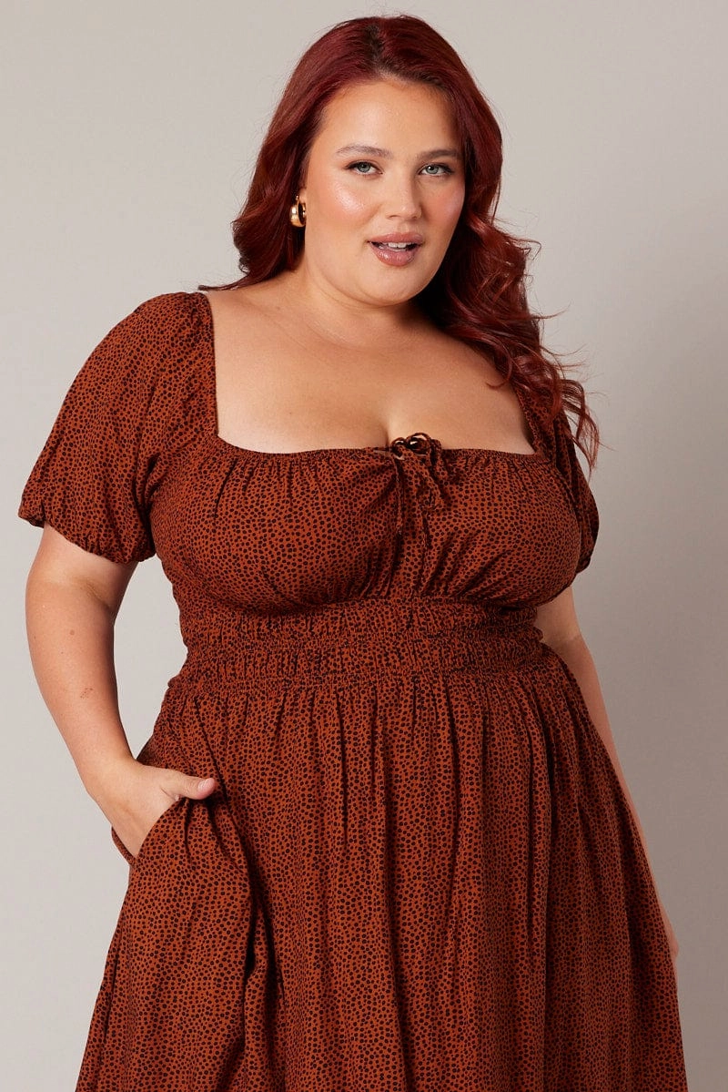 Brown Geo Midi Dress Short Sleeve Ruched Bust Relaxed and stylish