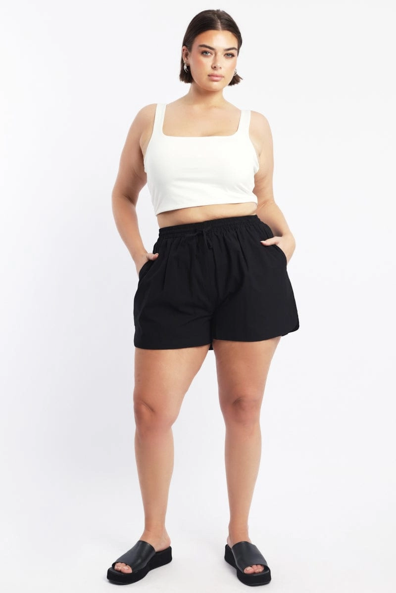 RipstopMaterial easygoing look Black Cotton Curve Hem Shorts